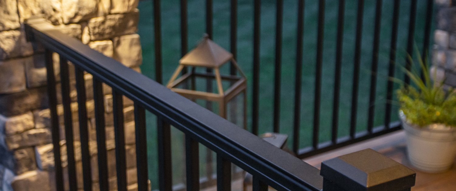 image of black aluminum deck railing with square balusters