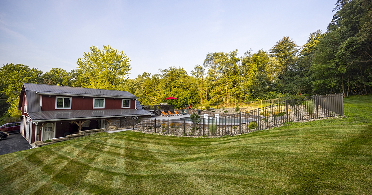 aluminum fence in backyard around pool