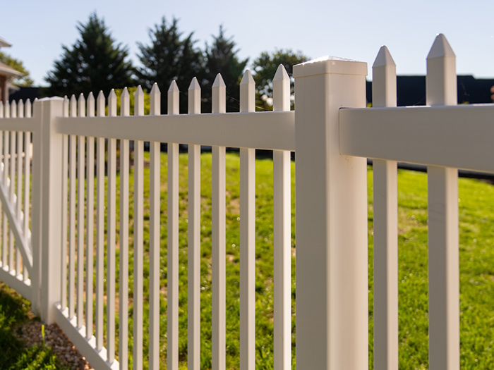 White picket yard vinyl fence